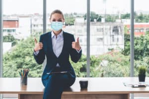 IT specialist wearing a face mask