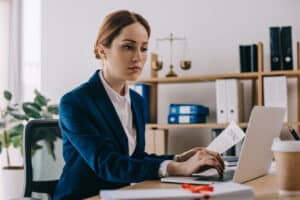 lawyer using a computer when migrating to the cloud