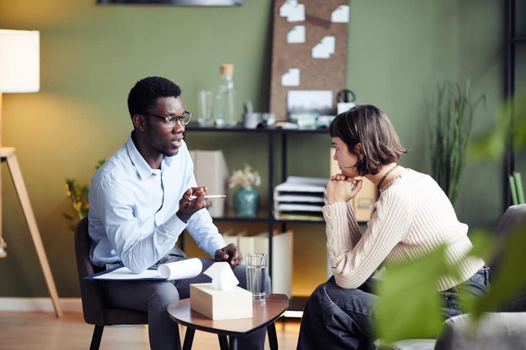 counselor talking to patient