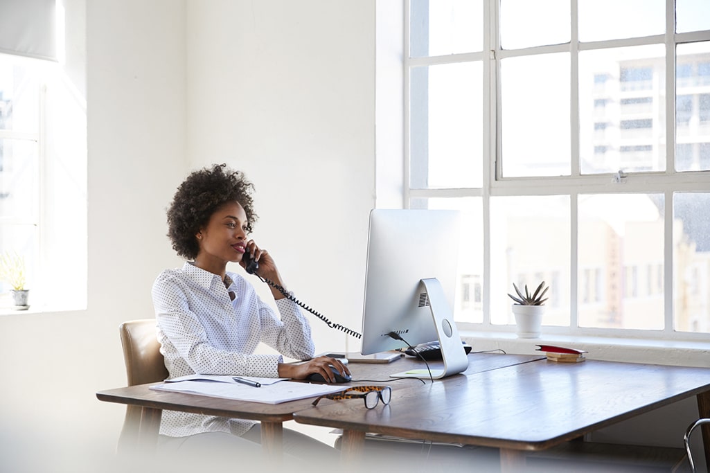 IT specialists talking on the phone