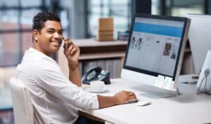 young business person using VoIP phone systems