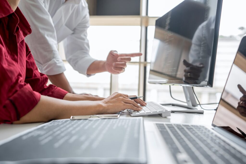 employees discussing network security vulnerabilities