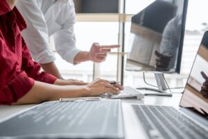 employees discussing network security vulnerabilities