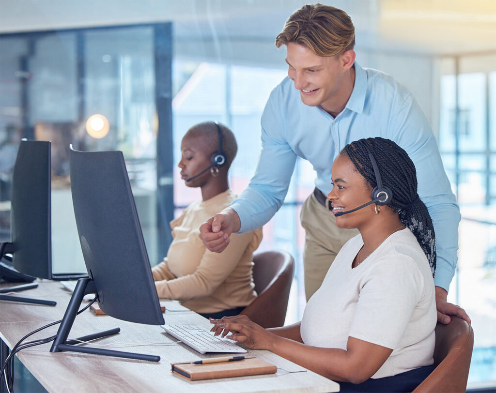 professional team working together in modern IT support office